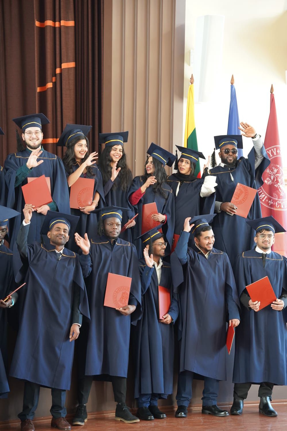 LevelUp graduates waving at Vytautas Magnus University, Lithuania
